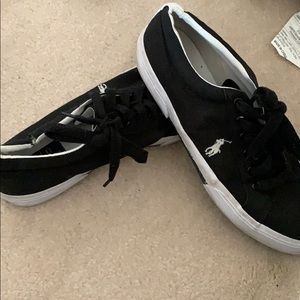 Men’s black polo shoes